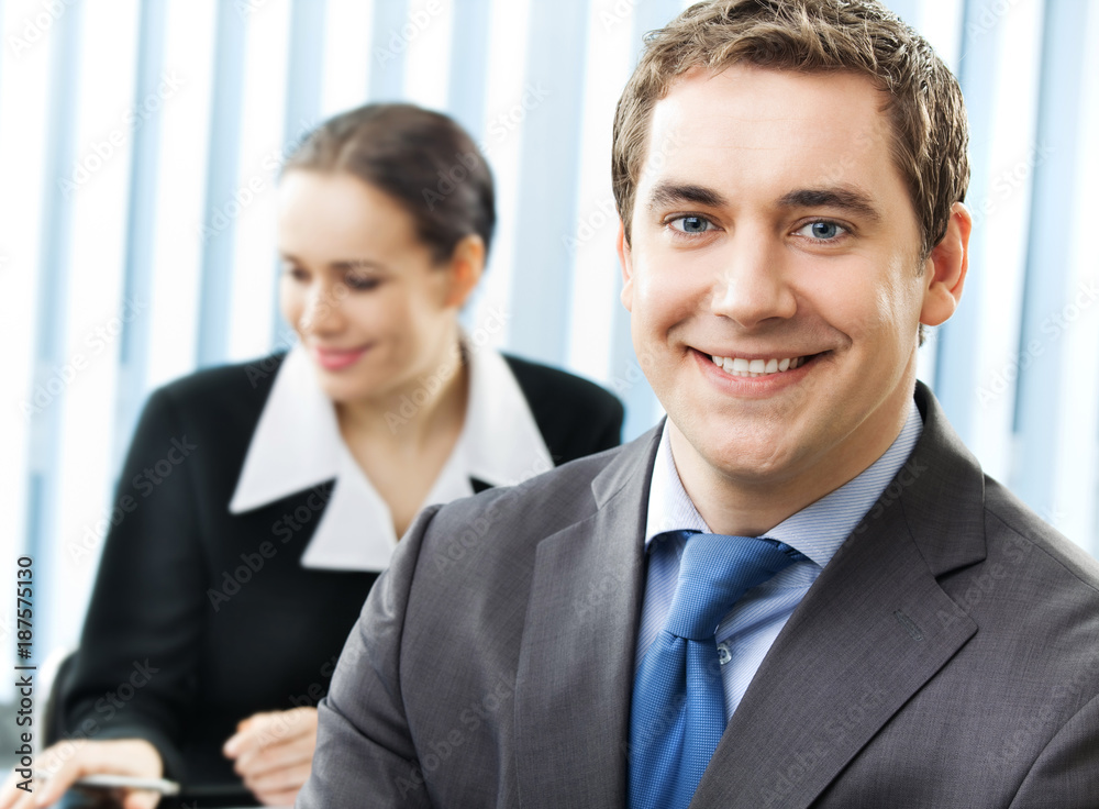 Portrait of smiling businessman at office Portrait of smiling businessman at office