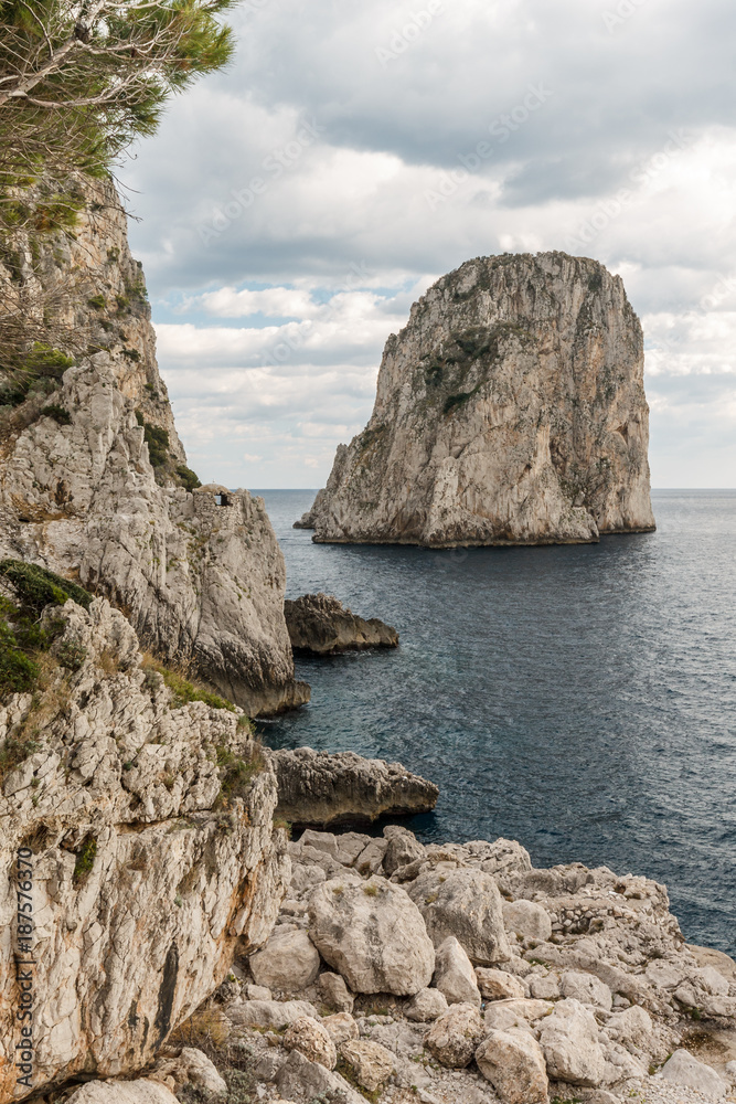 View of Capri (Campania, Italy) typical Faraglioni (sea stacks)