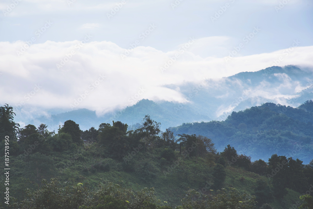 Fototapeta premium Beautiful mountains with clouds and fogs.