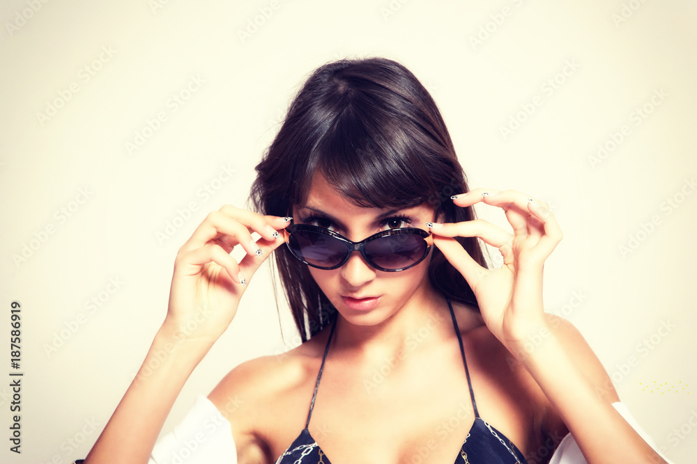 tanned woman portrait with sunglasses