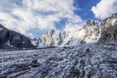 beautiful landscape with amazing rocks and snow capped mountains, kyrgyzstan, ala archa photo