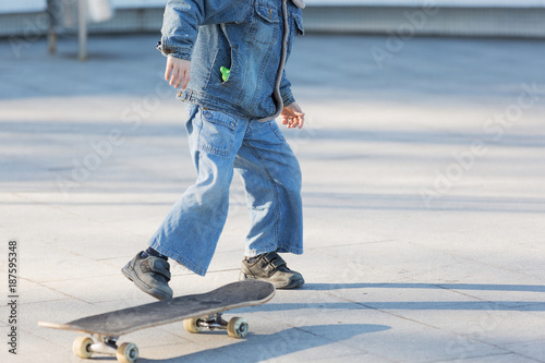 happy children skateboarding on fresh air, healthy lifestyle