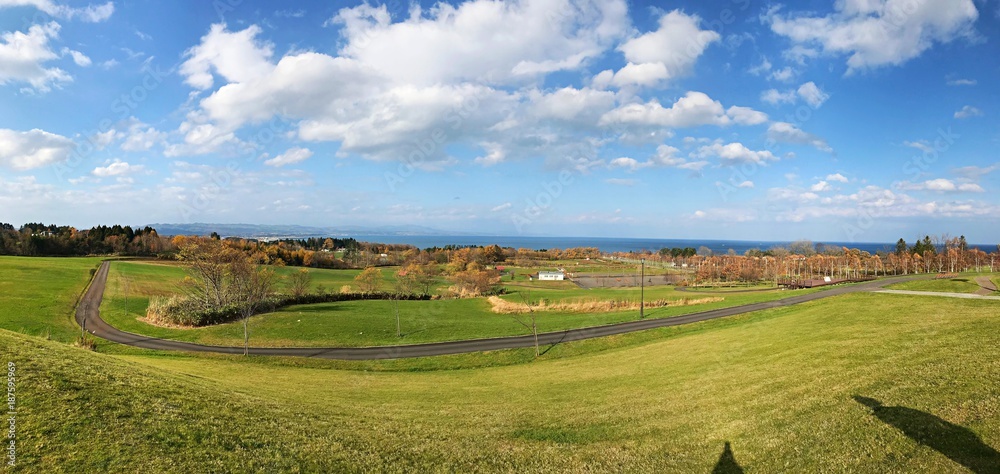 A beautiful landscape of the rural parking area near Hakodate, Hokkaido, Japan A beautiful landscape of the rural parking area near Hakodate, Hokkaido, Japan
