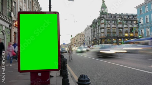 Time Lapse . Billboard with a Green Screen on the Busy Roadway.