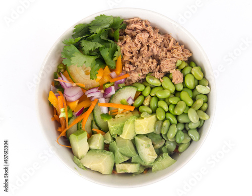 Buddha bowl of mixed vegetable with avocado and tuna fish