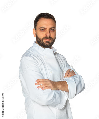 Young chef on white background.