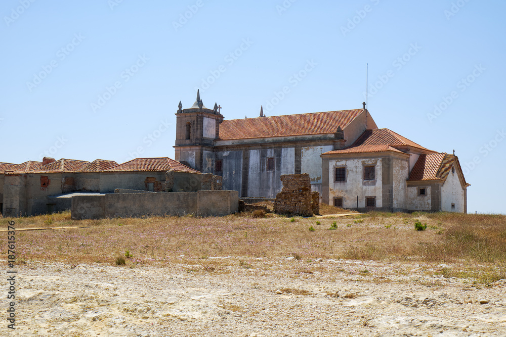 The view of Nossa Senhora do Cabo Church on the cape Espichel in Sesimbra, Portugal