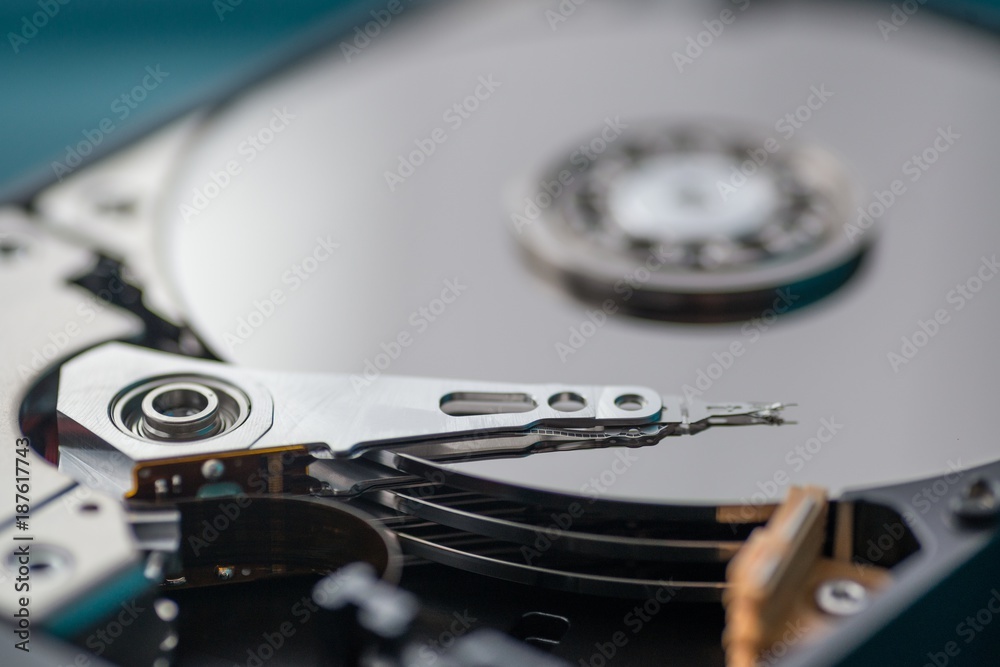 Close up on opened hard disk drive. Close up on opened hard disk drive.