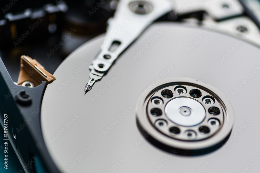 Close up on opened hard disk drive. Close up on opened hard disk drive.
