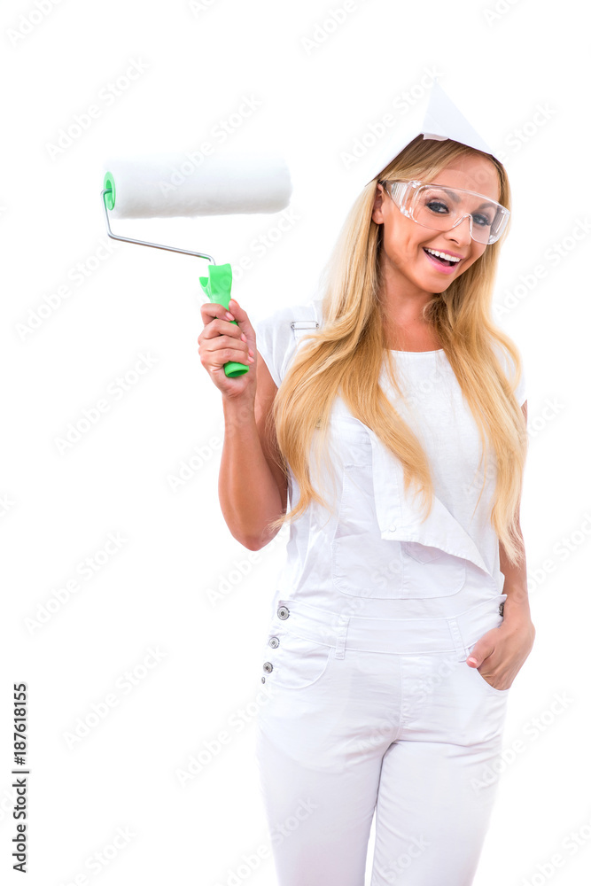 A beautiful young woman painting