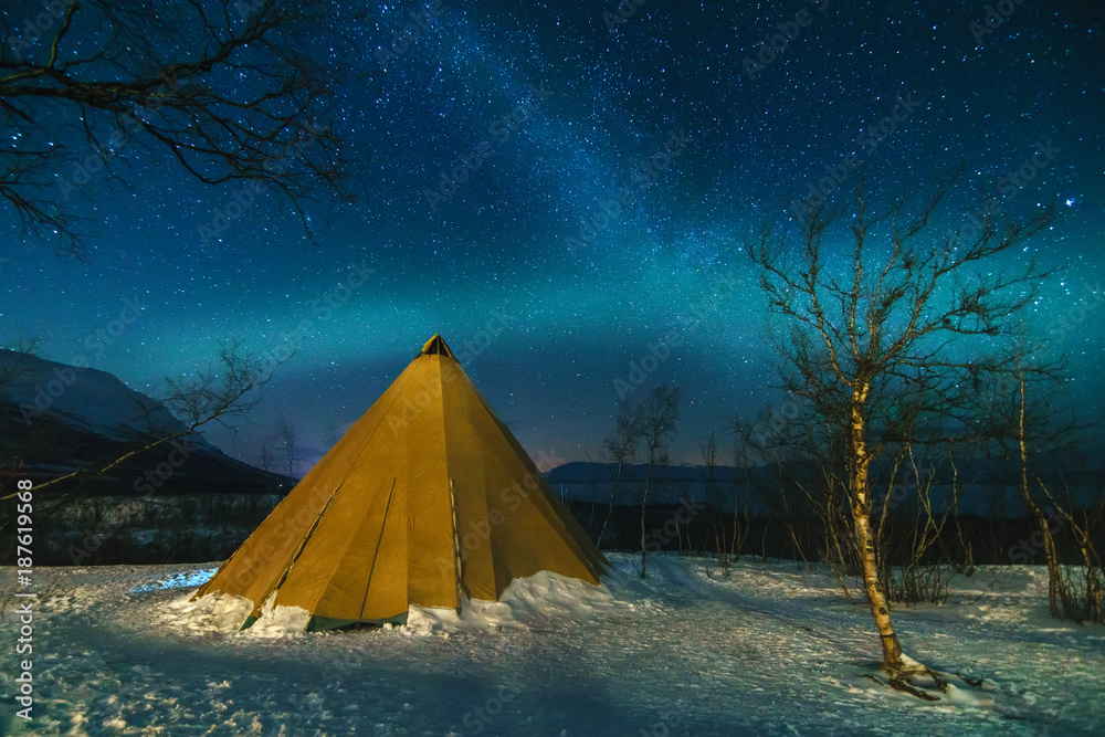 Winter Landscape with Eskimo Tent and Northern Lights.