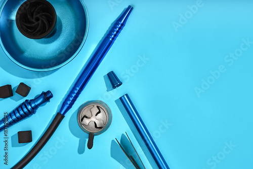 Top view of Hookah parts on light blue background photo