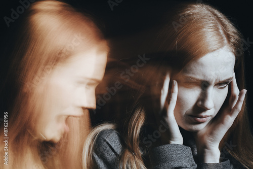 Woman with schizophrenia hearing voices photo