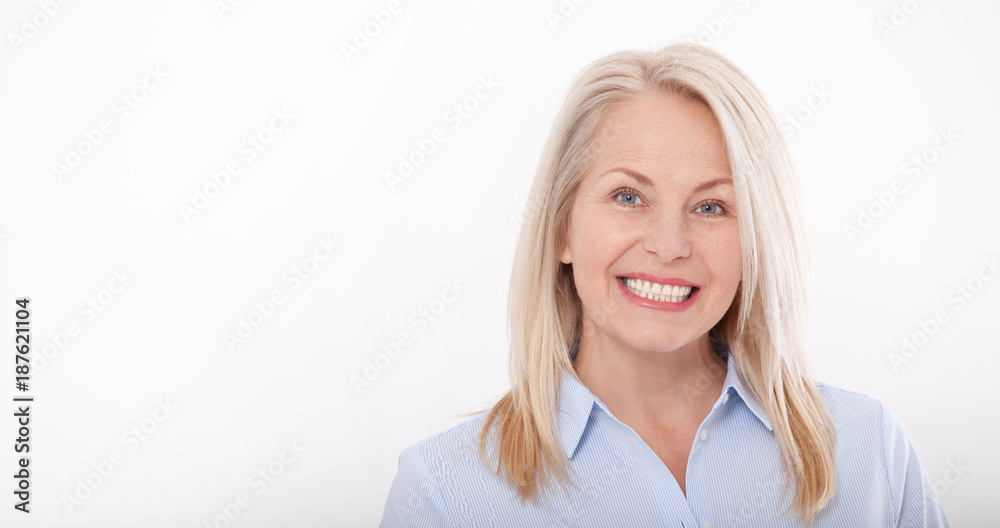 Portrait of a attractive business woman isolated. Middle-aged woman face close-up. Portrait of a attractive business woman isolated. Middle-aged woman face close-up.
