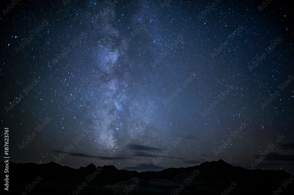 The Milky Way and meteors over Toadstool Geologic Park in northwestern Nebraska