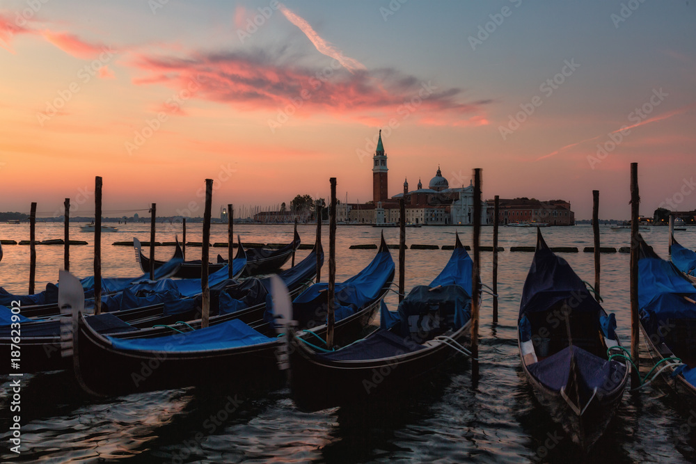 Gondolas in  Grand Canal on sunrise, Venice, Italy