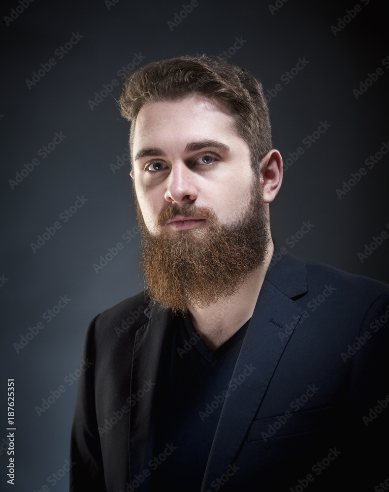 Fototapeta premium Portrait of a Teenage Hipster with Beard