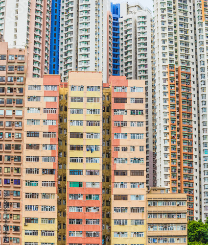 Photography Stadtszene aus Hongkong mit Darstellung verschiedener Hochhäuser in sehr enger Bebauung