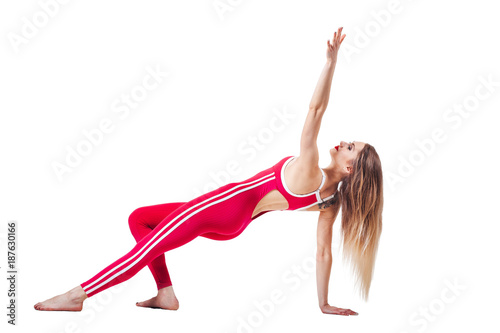 young beautiful woman in the red sports jumpsuit. Beautiful and healthy woman doing exercises isolated on white background . Sport, fitness, diet, weight loss and healthcare concept.