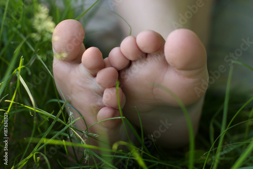 Barefooted baby legs
