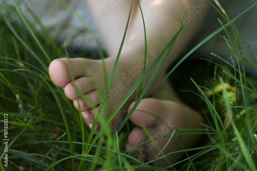 Barefooted baby legs
