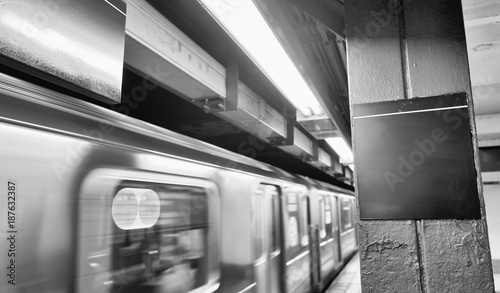 Subway station interior with coming train, New York City © jovannig