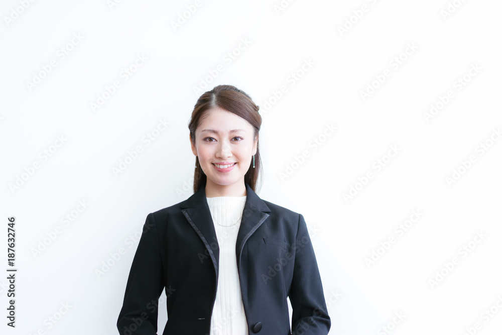 女性のポートレート(笑顔・スーツ姿) 女性のポートレート(笑顔・スーツ姿)