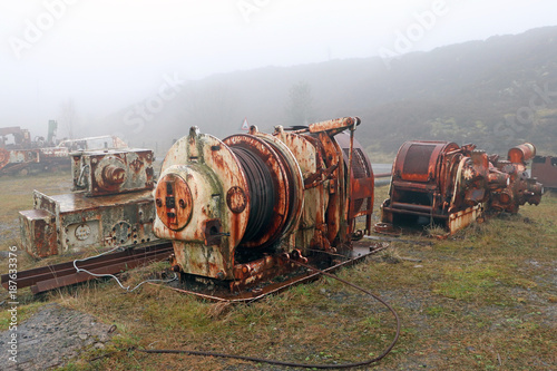 Old Rusted Mining Towing Equipment on Misty Mountain Top, Blaenavon, Wales  photo