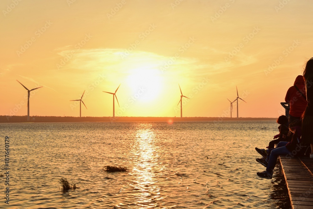 View of Wind Turbines During Sunset Near Gaomei Wetlands