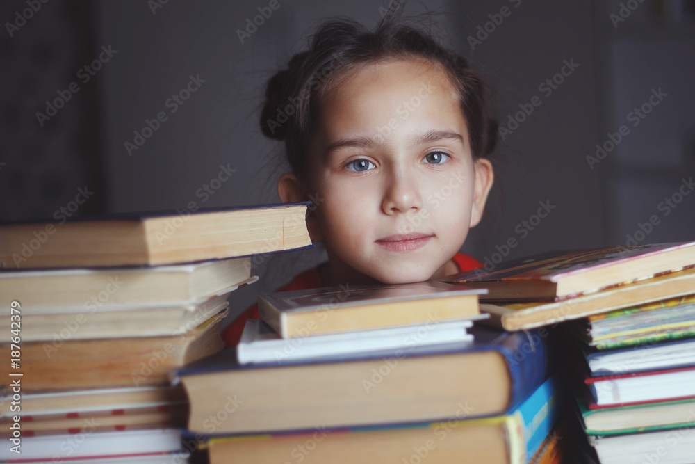 girl with piles of books girl with piles of books