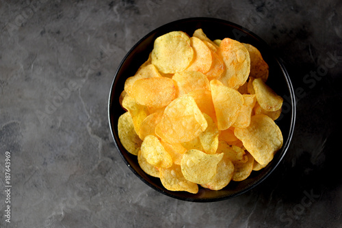 Delicious Potato chips with salt and seasonings.