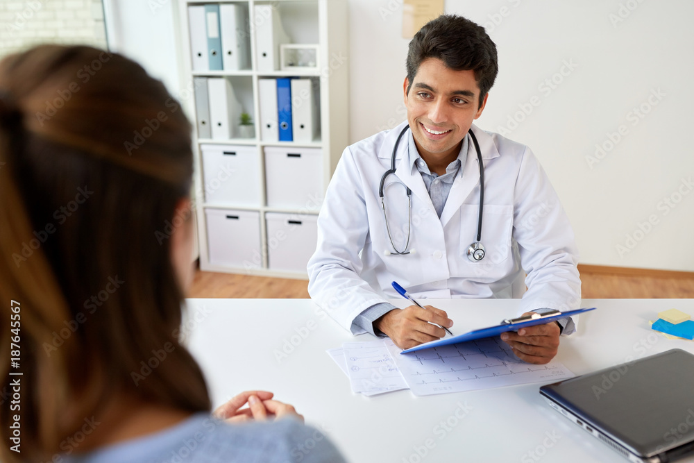 doctor with clipboard and patient at hospital doctor with clipboard and patient at hospital