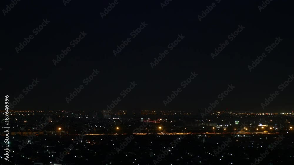 light of metro city highway traffic light at dark night light of metro city highway traffic light at dark night