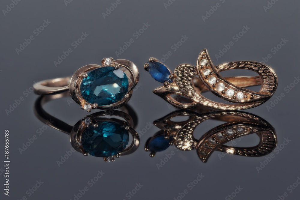 Gold earrings and ring with blue Topaz Gold earrings and ring with blue Topaz
