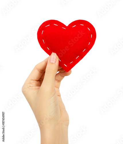 Red heart in woman hand isolated on white. Valentine s day
