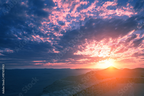 Beautiful dramatic sunset over desert