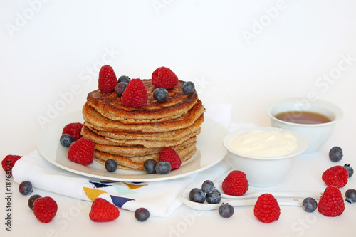 Healthy homemade pancakes with fruit and natural yogurt