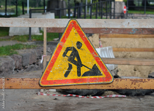 Old road sign roadwork