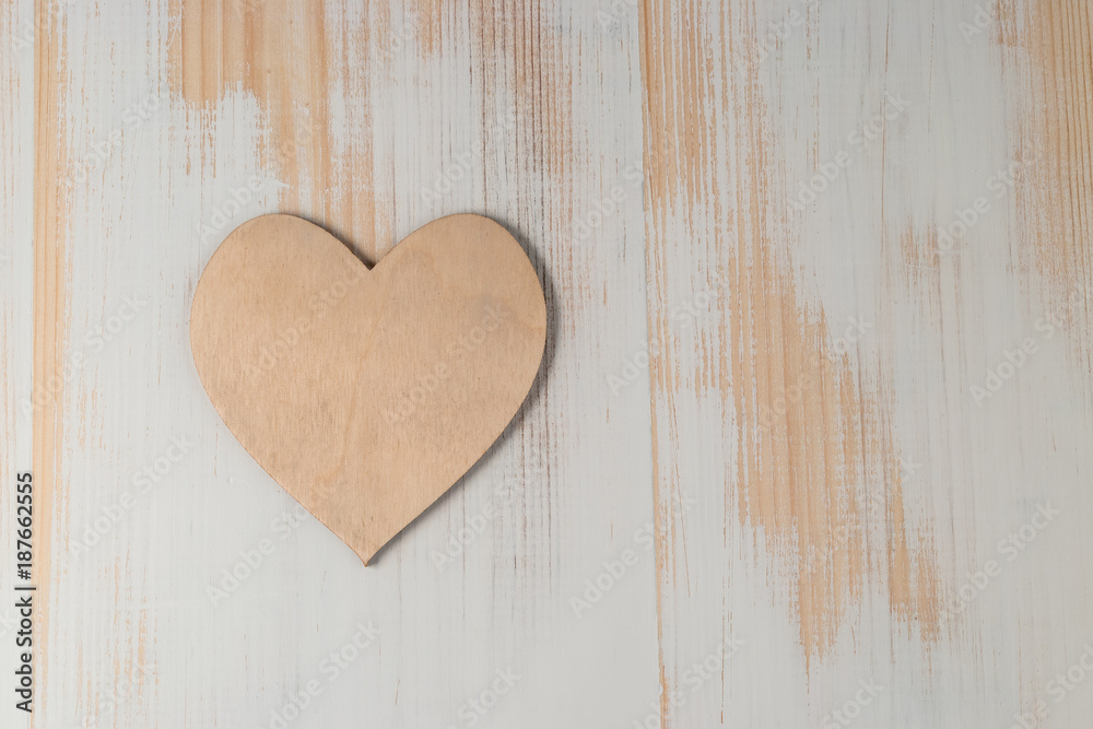 Wooden heart on wooden background. Valentines day.