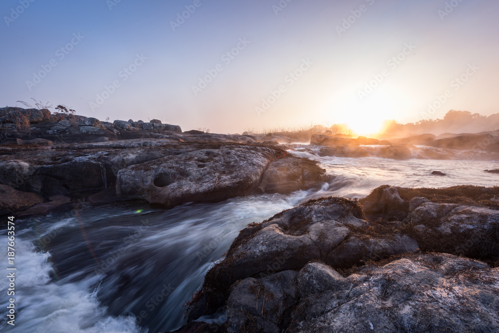 Waterfall on the Okavango River in Angola at sunrise Waterfall on the Okavango River in Angola at sunrise