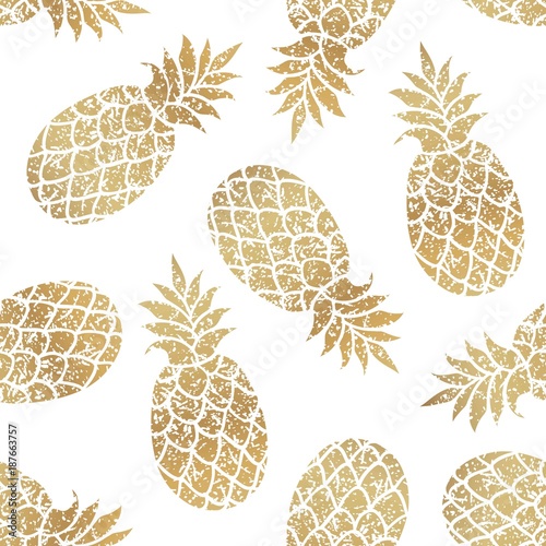 Golden pineapples seamless vector pattern on white background.