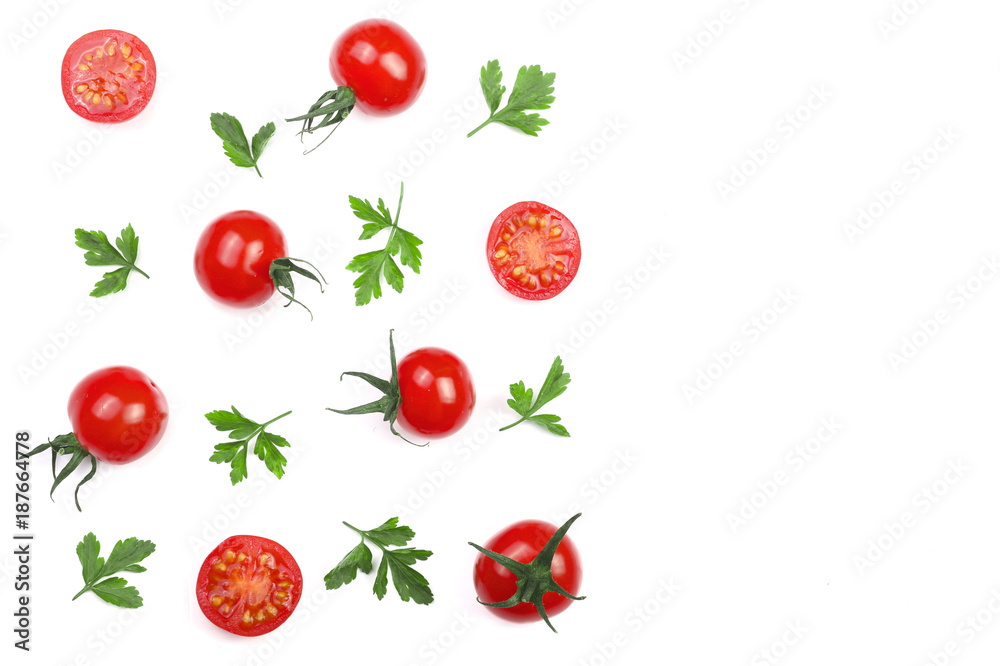 Cherry small tomatoes with parsley leaves isolated on white background with copy space for your text. Top view. Flat lay Cherry small tomatoes with parsley leaves isolated on white background with copy space for your text. Top view. Flat lay
