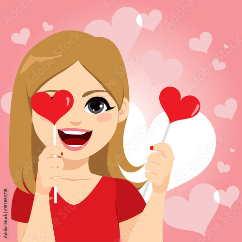 Happy woman smiling holding...