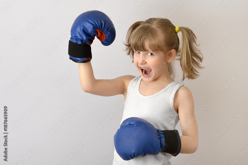 Kid boxer celebrates victory in the competition. Kid boxer celebrates victory in the competition.