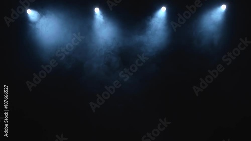 Abstract white spot light with smoke photo