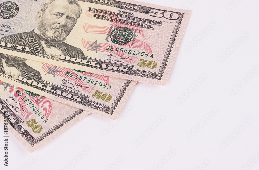 Three 50 dollar banknotes isolated on white background. Three 50 dollar banknotes isolated on white background.