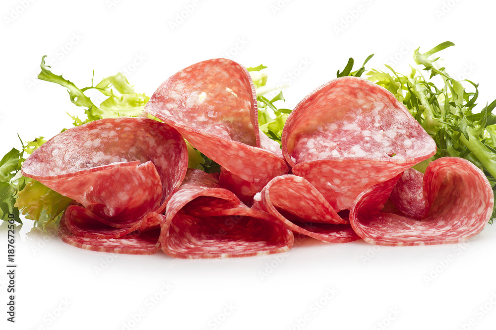 Salami sliced and bread with lattuce on white