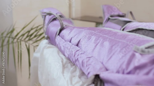 Patient in beauty clinic during pressotherapy