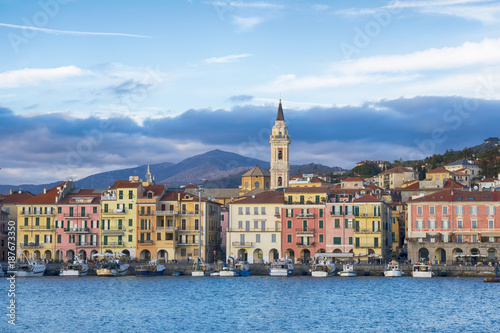 Oneglia colorful houses and the harbor, Imperia (Italy). Typical village of the Ligurian coast, mediterranean sea.