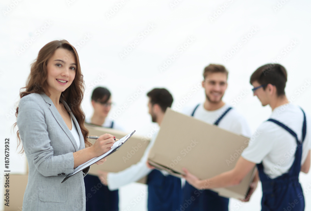 Businessman with documents, creating a stack of cardboard boxes. Businessman with documents, creating a stack of cardboard boxes.